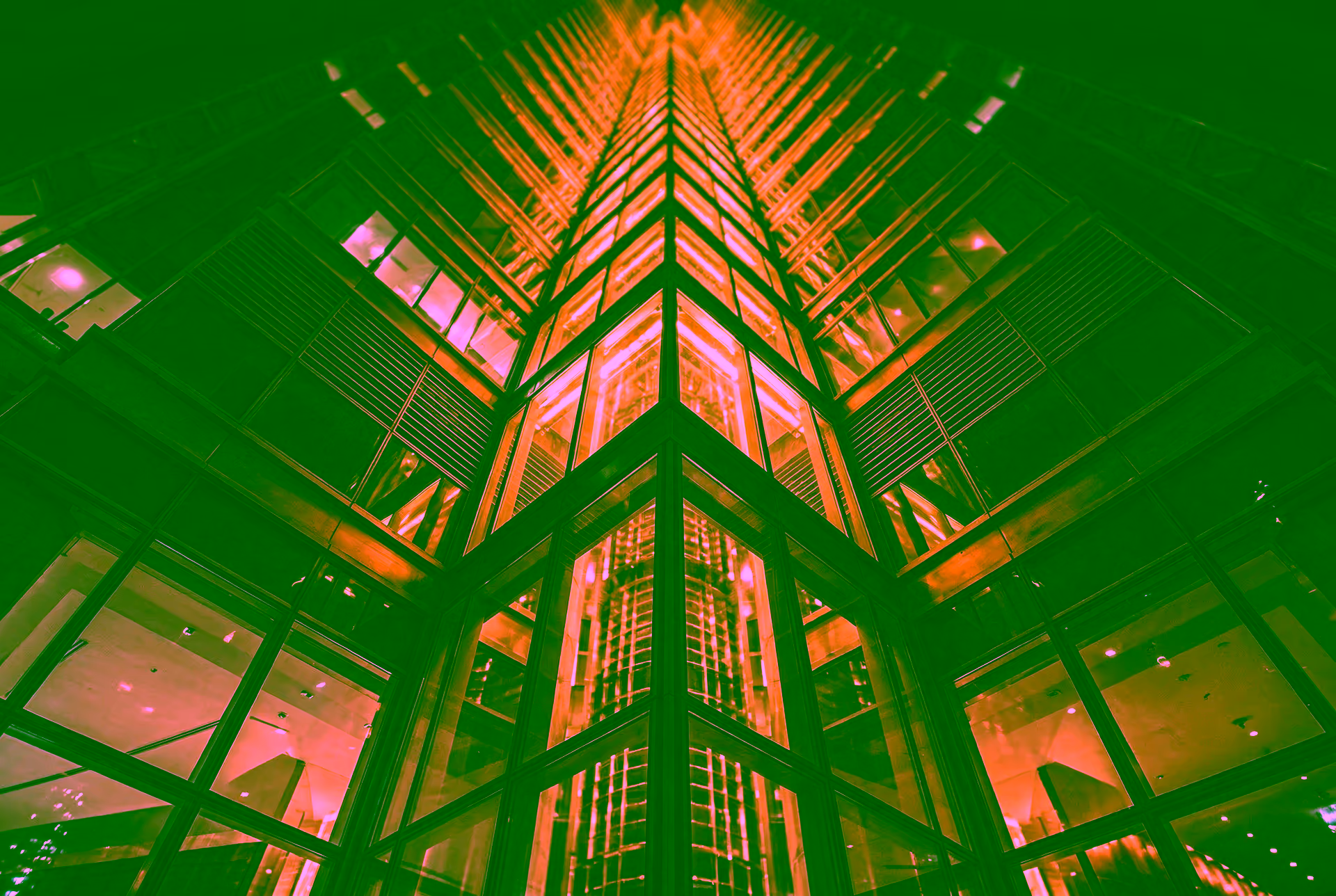 Glass skyscraper rising upward representing GDV Holdings' compounding enterprise value and structural growth