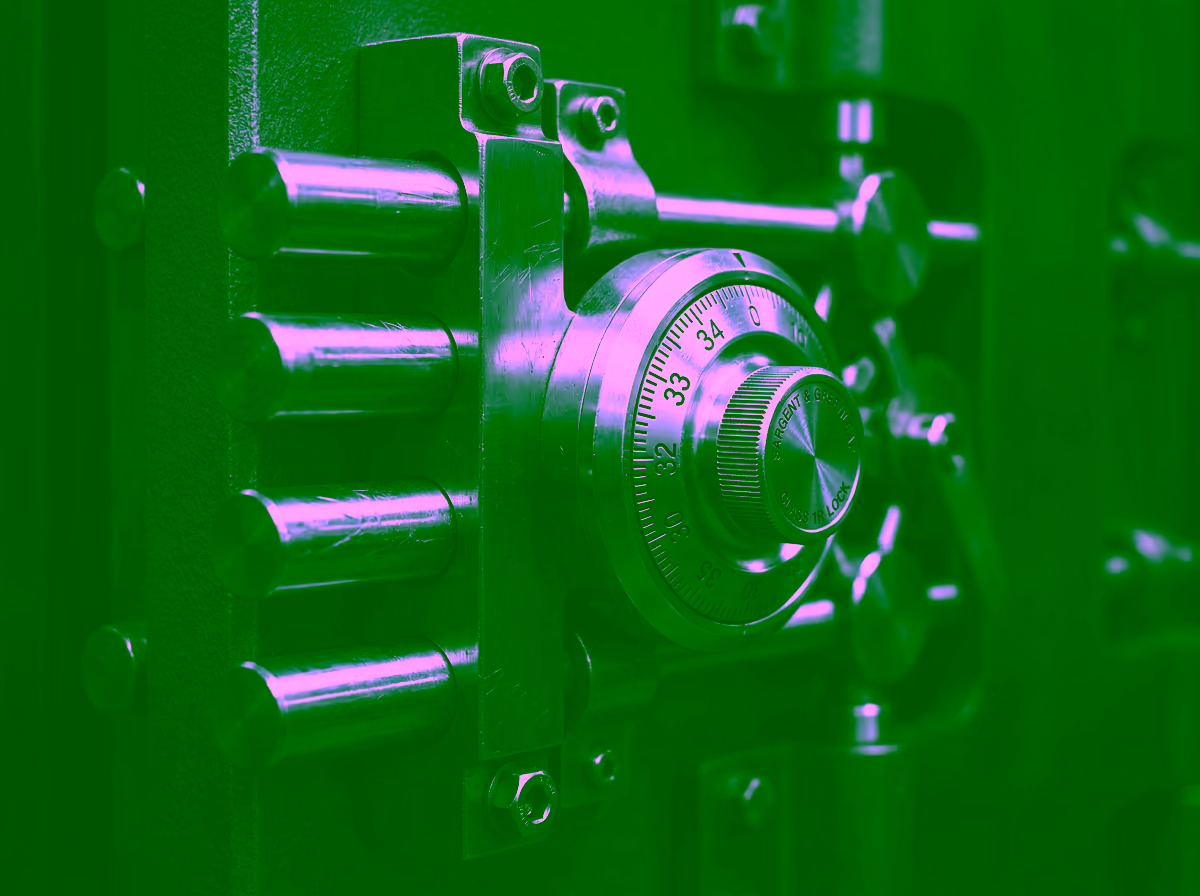 Macro close-up of a precision vault lock mechanism, representing GDV Holdings' structured governance oversight and controlled access to capital