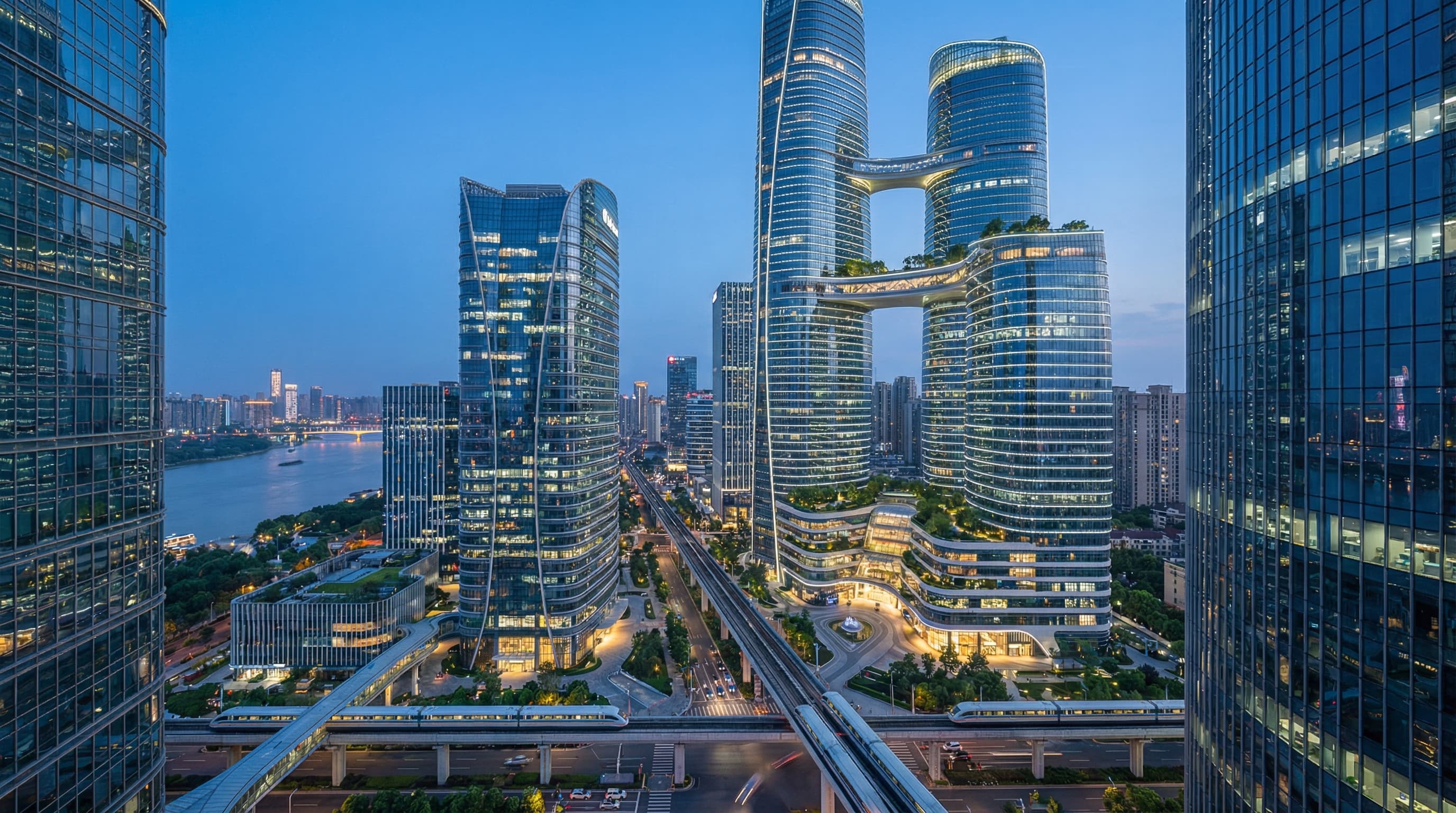 Futuristic glass skyscrapers at dusk, representing GDV Holdings' globally oriented enterprise portfolio
